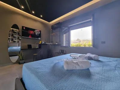 Letto o letti in una camera di Tropicalia Suites