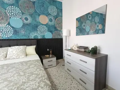 Letto o letti in una camera di Vulkania Glamour Apartment - bilocale Catania centro