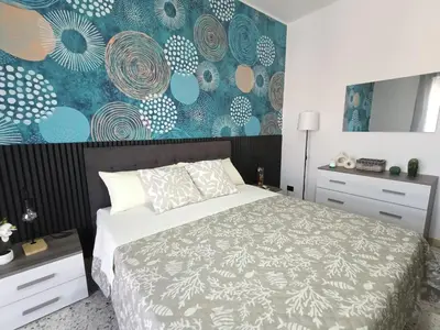 Letto o letti in una camera di Vulkania Glamour Apartment - bilocale Catania centro