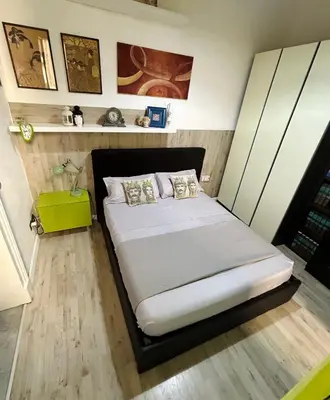 Letto o letti in una camera di welcoming house Catania