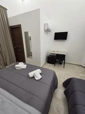 Letto o letti in una camera di Sicily charm B&B