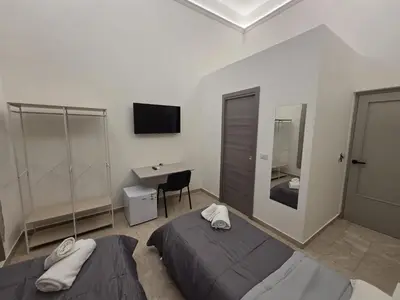 Letto o letti in una camera di Sicily charm B&B