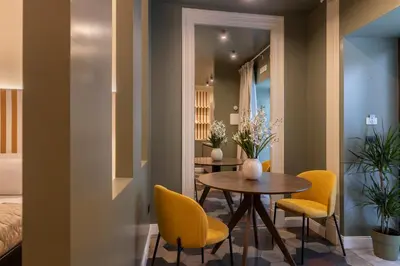 Area soggiorno di Carmela Homes & Residences