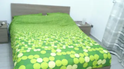 Letto o letti in una camera di Etnamare Elite