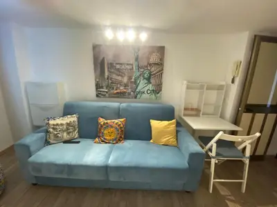 Area soggiorno di Happy House bis Catania Centro