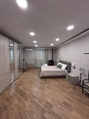 Letto o letti in una camera di Villa Rosaria
