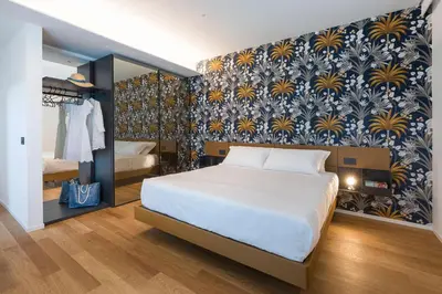 Letto o letti in una camera di Villa Orchidea