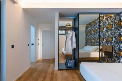 Letto o letti in una camera di Villa Orchidea