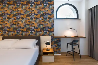 Letto o letti in una camera di Villa Orchidea