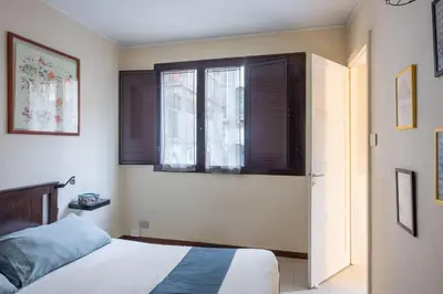 Letto o letti in una camera di Casa Bellini