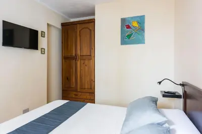 Letto o letti in una camera di Casa Bellini