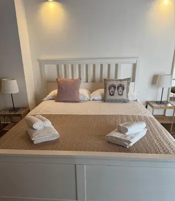 Letto o letti in una camera di Qori Sicilian Stay
