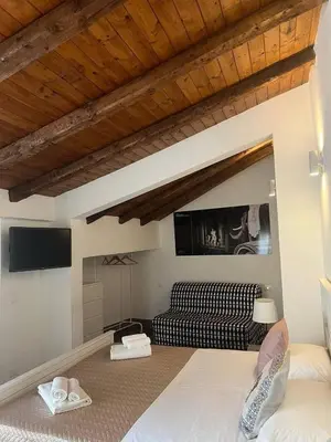 Letto o letti in una camera di Qori Sicilian Stay