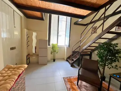 Area soggiorno di Giatì Studio - Cortile Privato & Metro