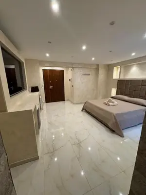 Letto o letti in una camera di Bquadro suite