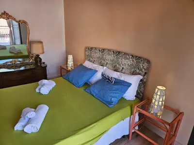 Letto o letti in una camera di Zafferana Etna House by Holiday World