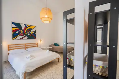 Letto o letti in una camera di Living Simply