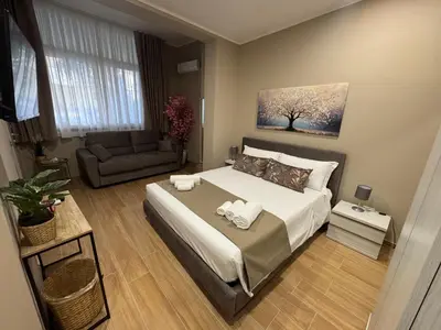 Letto o letti in una camera di Palme Suites