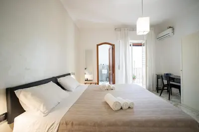 Letto o letti in una camera di Cavaliere Suites Catania