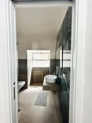 Letto o letti in una camera di Casa vacanze Le farfalle