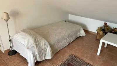 Letto o letti in una camera di Casa Via Vigo