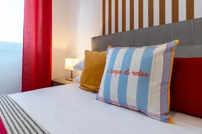 Letto o letti in una camera di I Miti DellEtna - Aci e Galatea1 by Harmony H...