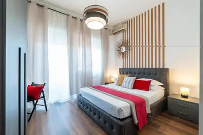 Letto o letti in una camera di I Miti DellEtna - Aci e Galatea1 by Harmony H...