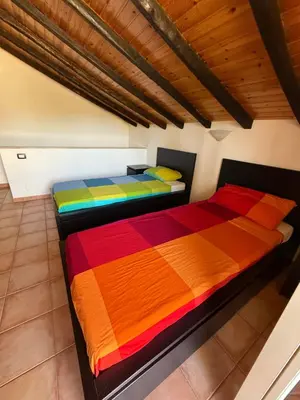 Letto o letti in una camera di Etna Beach House