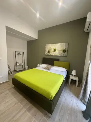 Letto o letti in una camera di Vacation Home City Center of Catania