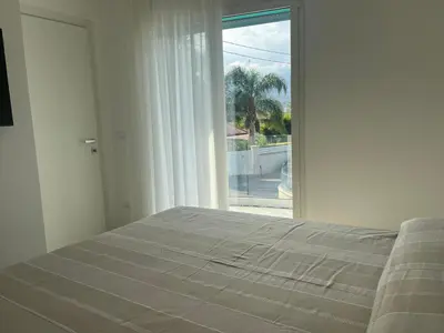 Letto o letti in una camera di I Siciliani beach house