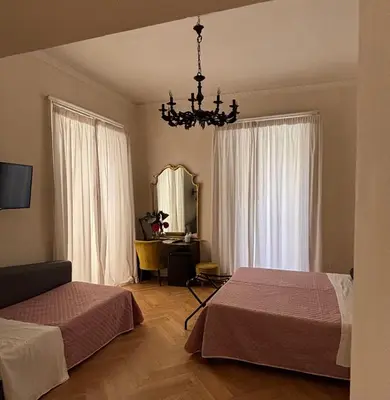 Letto o letti in una camera di Stanze di Agatha