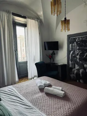 Letto o letti in una camera di Stanze di Agatha
