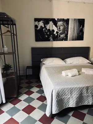 Letto o letti in una camera di Stanze di Agatha