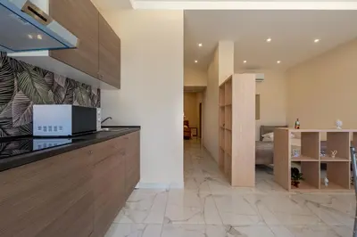 Cucina o angolo cottura di GuestHost - Isole Ciclopi View - Lovely Apartment