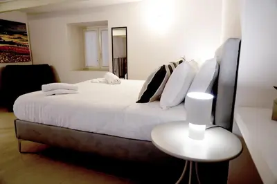 Letto o letti in una camera di RHOME Crispi LOFT