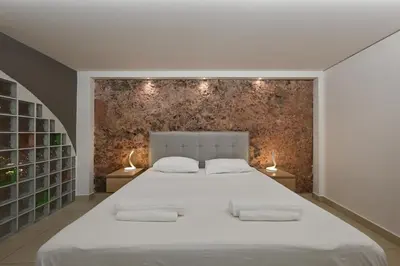 Letto o letti in una camera di Dimora Montevergine