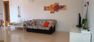 Area soggiorno di Oasis House