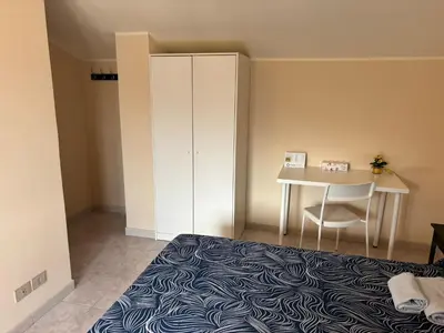 Letto o letti in una camera di La mia dolce casa