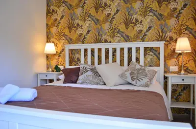 Letto o letti in una camera di Casa D'Amuri