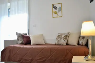 Letto o letti in una camera di Casa D'Amuri