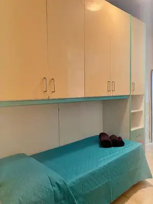 Letto o letti in una camera di Cialdini di Mare