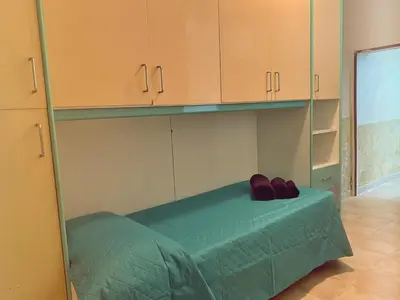 Letto o letti in una camera di Cialdini di Mare