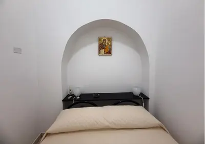 Letto o letti in una camera di Donna Lola