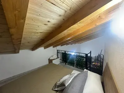 Letto o letti in una camera di House Fiorentino