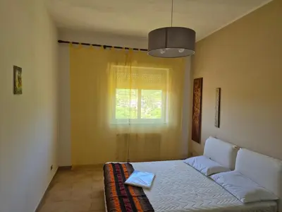 Letto o letti in una camera di Casa Egle - Between Etna and the sea