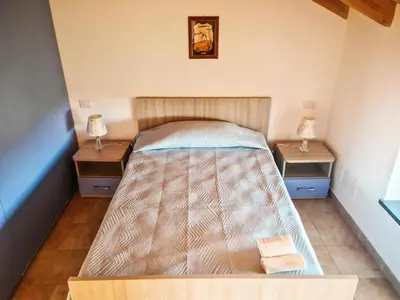Letto o letti in una camera di La Casa del Cedro