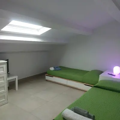 Letto o letti in una camera di Il Cortile