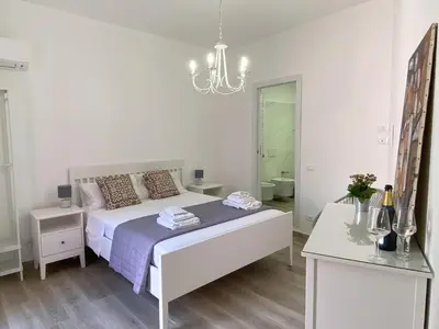 Letto o letti in una camera di Le corti dell'Etna