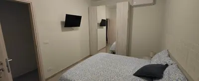 Letto o letti in una camera di Short Location Paratore Casa Melina