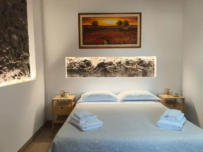 Letto o letti in una camera di Beautiful Etna's view